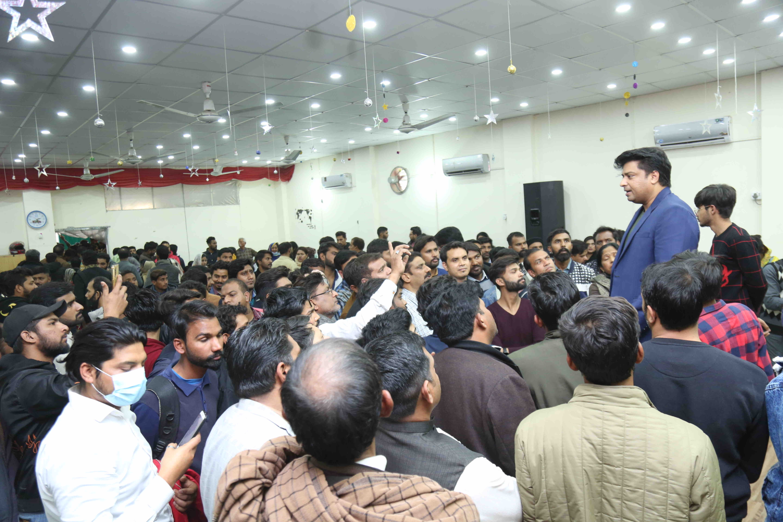 Rev Dr Naeem Nasir guiding Christian students about Fully Funded Scholarships in Pakistan