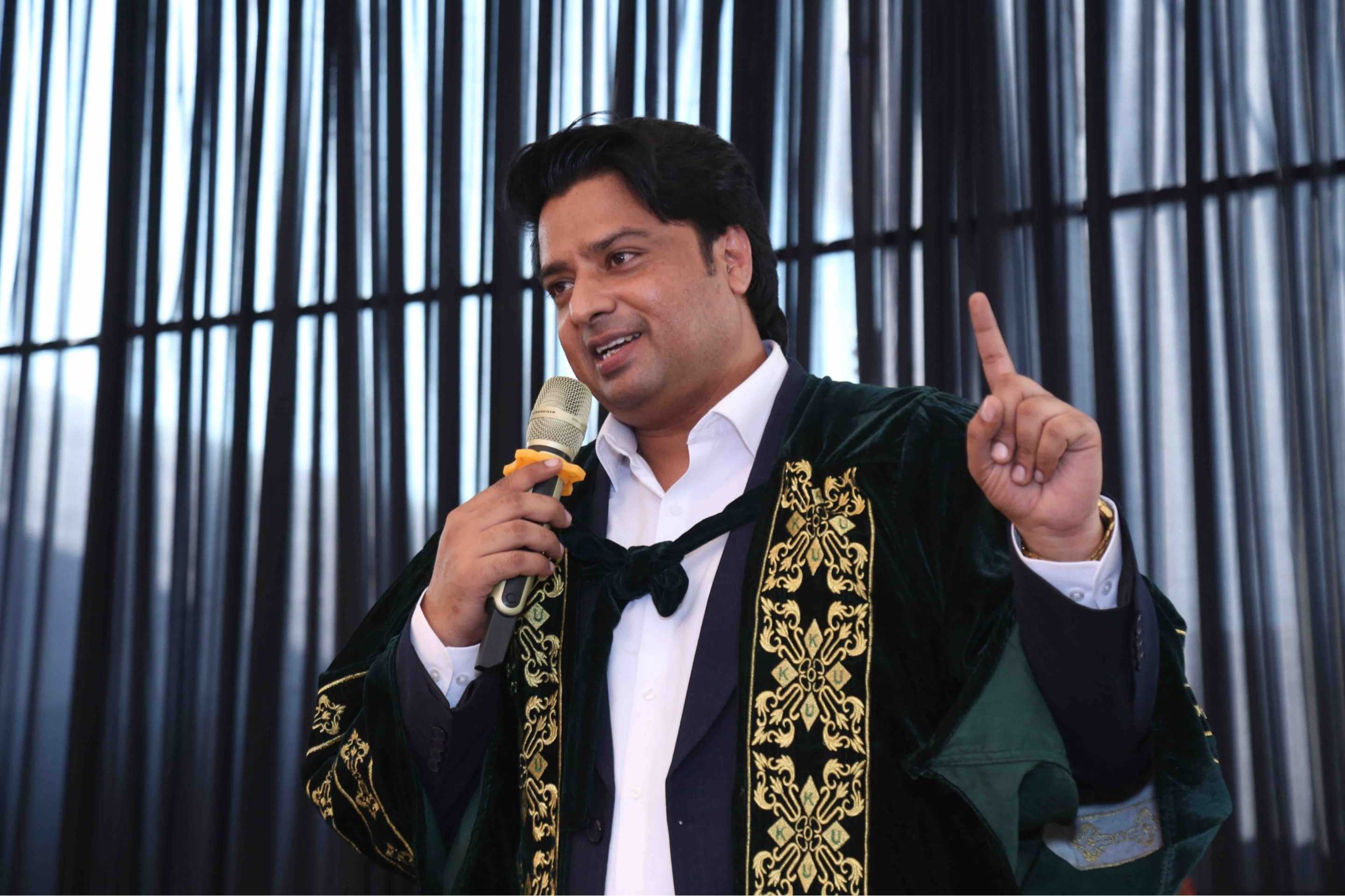 Rev. Dr. Naeem Nasir speaking at Revelation Bible College graduation ceremony about church planting in Pakistan